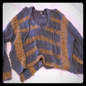 Hooded striped sweater.